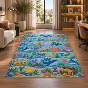 ocean animal alphabet rug displayed in a lounge with wooden shelves