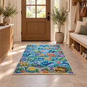ocean animal alphabet rug displayed in a entryway beside a wooden door