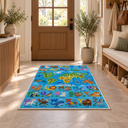 bright animal alphabet map rug displayed in a entryway beside a wooden door
