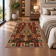 Gingerbread Christmas Tree Christmas area rug in a bedroom beside the bed