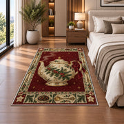Holly Teapot Christmas area rug in a bedroom beside the bed