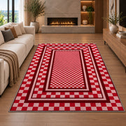 Red and Pink Checkered Border area rug in a living room with a fireplace