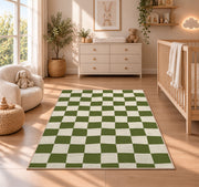 Sage Green Checkerboard area rug in a nursery beside a crib