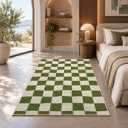 Sage Green Checkerboard area rug in a bedroom with an arched window