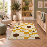 Retro Daisy Checker area rug in a nursery with a crib and armchair