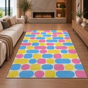 Pastel Pill Pattern area rug in a living room with a fireplace