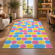 Pastel Pill Pattern area rug in a home office beside a desk