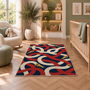 Looping Fire Hoses firefighter rug in a nursery with a crib and armchair