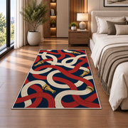 Looping Fire Hoses firefighter rug in a bedroom beside the bed