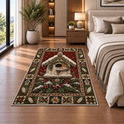 Robin Birdhouse in Snow Christmas area rug in a bedroom beside the bed