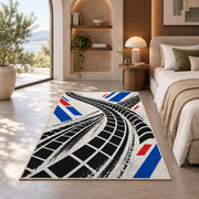 Tire Track Pattern police rug in a bedroom with an arched window