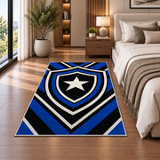 Blue Line Shield Star police rug in a bedroom beside the bed