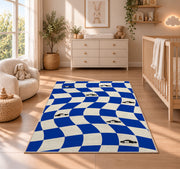 Wavy Checker with Patrol Cars police rug in a nursery beside a crib