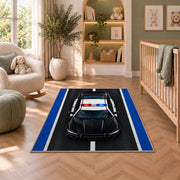 Police Car on the Road police rug in a nursery with a crib and armchair