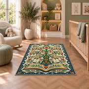Tree of Books Folk Art area rug in a nursery with a crib and armchair