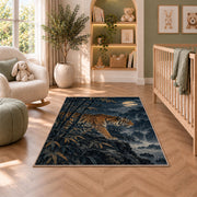Tiger in Bamboo Moonlight tiger rug in a nursery with a crib and armchair
