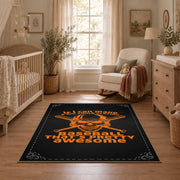 black orange vintage mechanic quote workshop area rug, styled product view 3