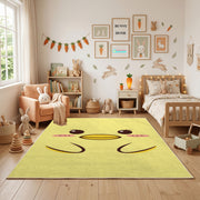 Yellow Winking Face Area Rug — angled floor view