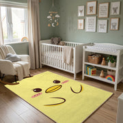 Yellow Winking Face Area Rug — front-facing room view