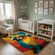 Colorful geometric owl rug wide room view in a modern nursery