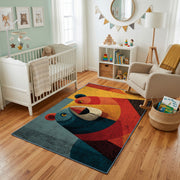 Colorful geometric toucan rug styled with soft nursery decor