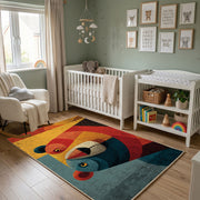 Colorful geometric toucan rug wide room view in a modern nursery