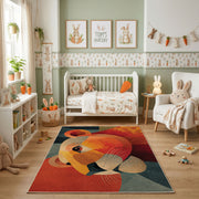 Colorful geometric lion rug shown beside a child's bed