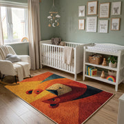 Colorful geometric lion rug wide room view in a modern nursery