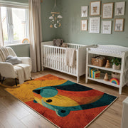 Colorful geometric whale rug wide room view in a modern nursery