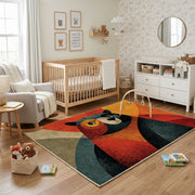 Colorful geometric woodland animal rug shown near a reading corner