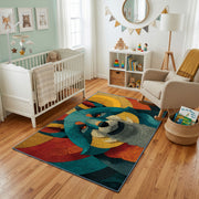 Colorful geometric raccoon rug styled with soft nursery decor