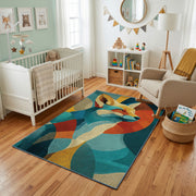 Colorful geometric deer rug styled with soft nursery decor