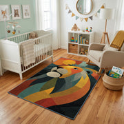 Colorful geometric lion rug styled with soft nursery decor