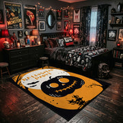 cute black cat inside a pumpkin faux velvet Halloween area rug, wood floor styling