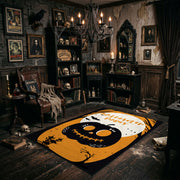 cute black cat inside a pumpkin faux velvet Halloween area rug, wide interior view