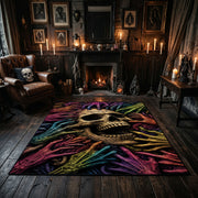 Neon Skull and Skeleton Hands Area Rug displayed on a dark floor beside red accented shelving