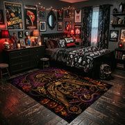 Ornate Gothic Skull Area Rug shown beside a dark bed in a Halloween themed bedroom
