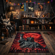 Red Moon Cloaked Reaper Area Rug front view in a warm candlelit room