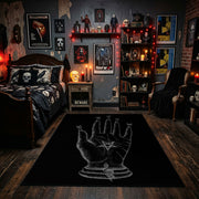 Mystical Hand Line Art Area Rug displayed beneath gothic wall art