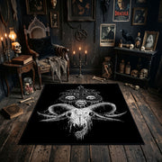 Horned Skull Illustration Area Rug styled in a candlelit gothic living room