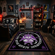 Purple Mystical Emblem Area Rug displayed beneath gothic wall art