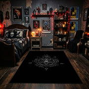 Subtle Occult Crest Area Rug displayed beneath gothic wall art