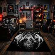 Winged Occult Figure Area Rug displayed beneath gothic wall art