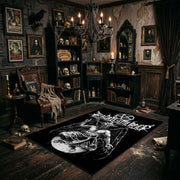 Winged Occult Creature Area Rug angled view beside gothic bedroom furniture