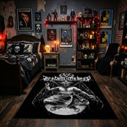 Winged Occult Creature Area Rug displayed beneath gothic wall art