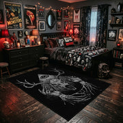 Antlered Skull Crescent Area Rug shown beside a dark bed in a Halloween themed bedroom