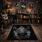 Antlered Skull Crescent Area Rug front view in a warm candlelit room