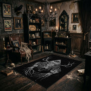 Antlered Skull Crescent Area Rug angled view beside gothic bedroom furniture