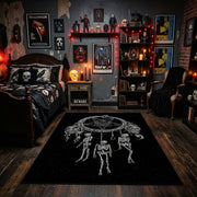 Skeletal Hand Moon Area Rug displayed beneath gothic wall art