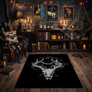 Minimal Horned Skull Emblem Area Rug front view near a fireplace